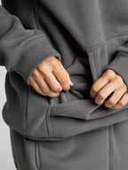 Rese-hoodie i flygplansläge